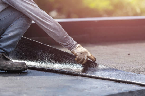 Professional Waterproofing technician working in Mundelein, IL